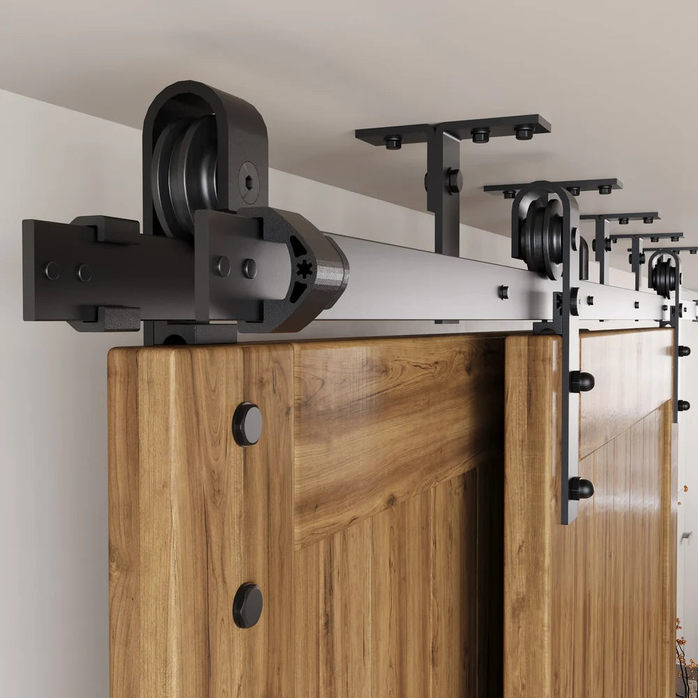 Ceiling-mounted track system with overlapping sliding wood barn doors